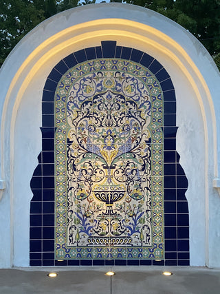 Decorative tile mural with intricate patterns.