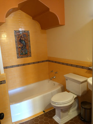 Yellow field tiles with deco trim inserts and backsplash