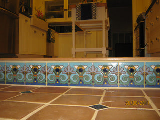 Saltillo floor tiles with Spanish stair risers