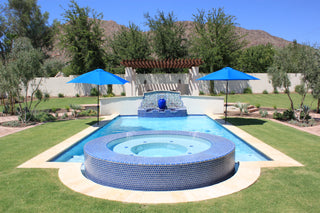 Custom outdoor fountain mural with classic California tile design - full pool view