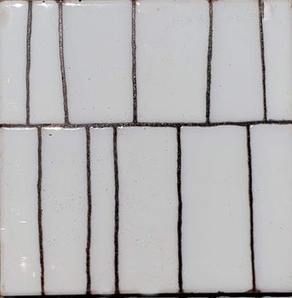 Modern white on white kitchen tile design